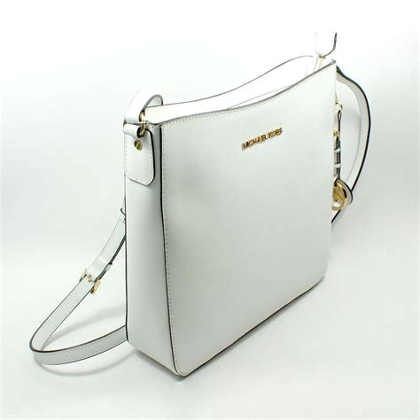 michael kors jet set travel logo small white crossbody bag|Michael Kors jet set collection.